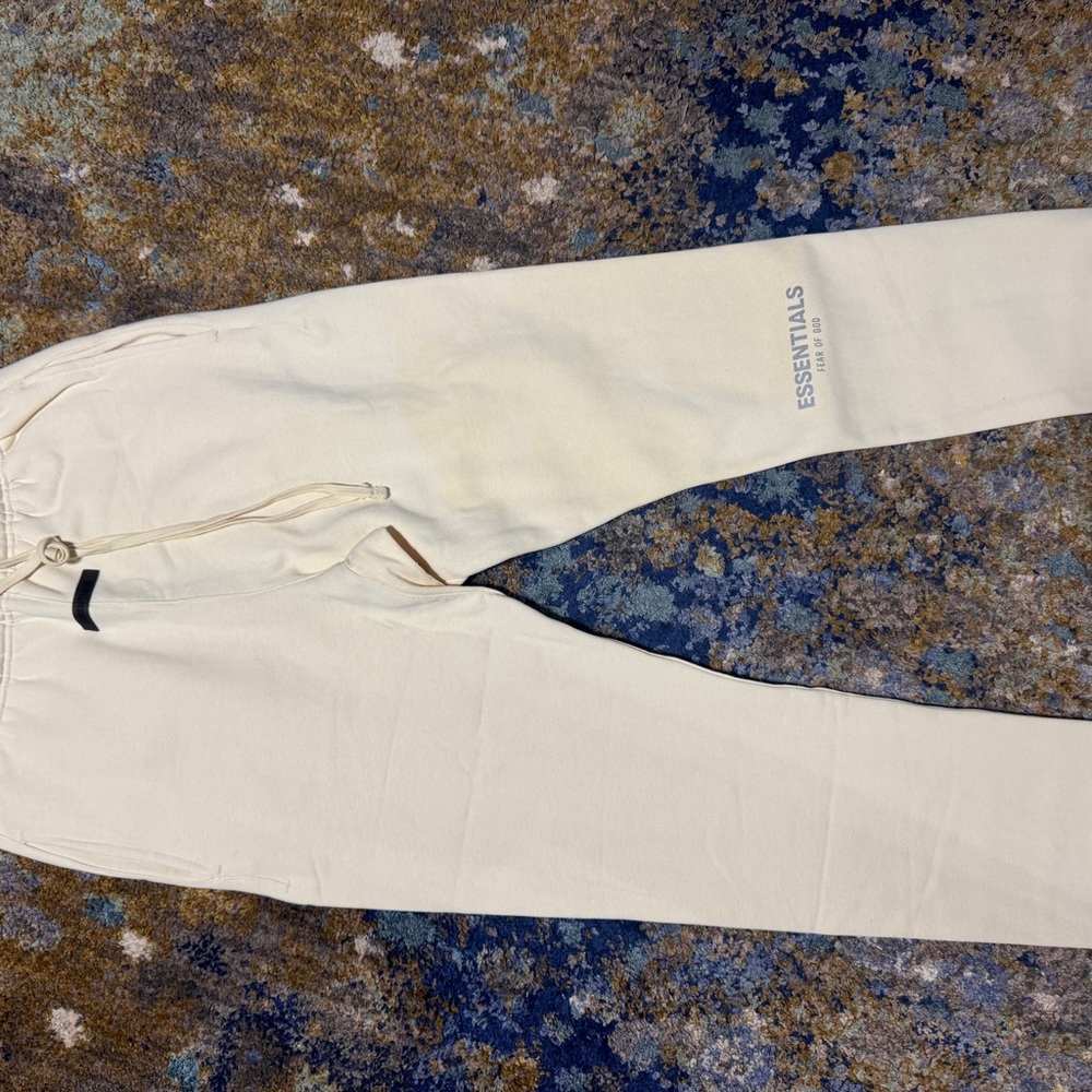 Essentials Cream sweats runs big
